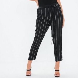 Plus sized black pinstriped trousers